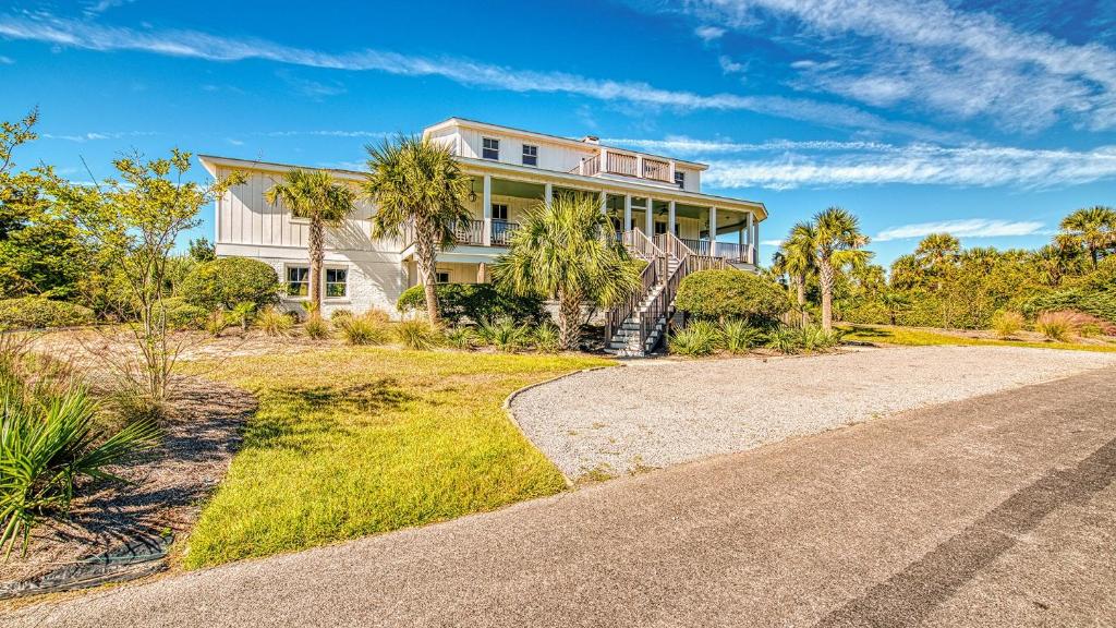 Celebrate the beauty of the beach in this luxurious second row home home